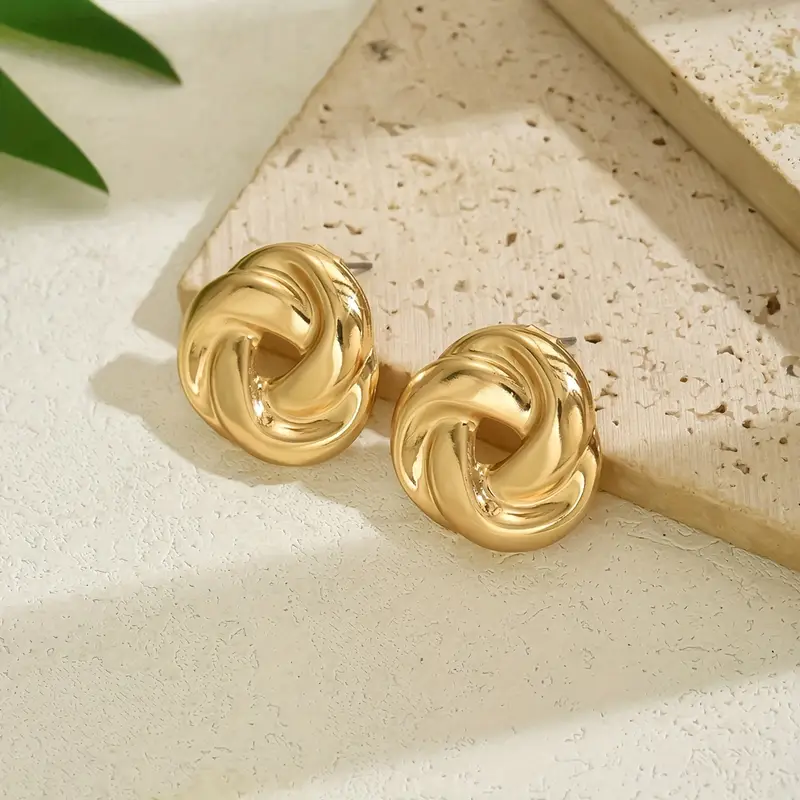 Boucles d'oreilles en spirale dorées vintage