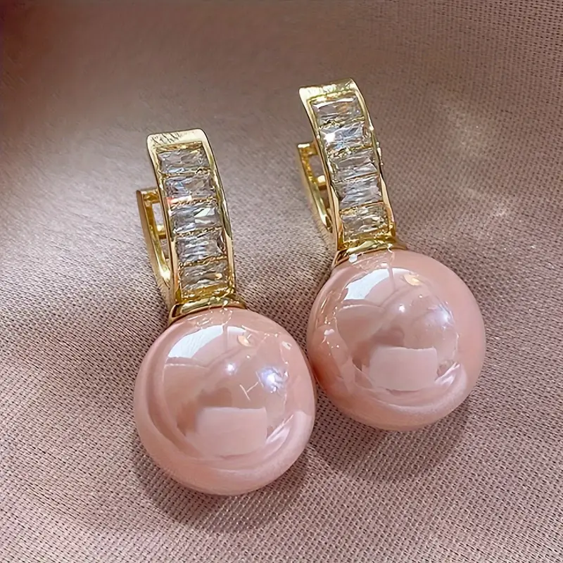 Boucles d'oreilles en or avec zirconia rose