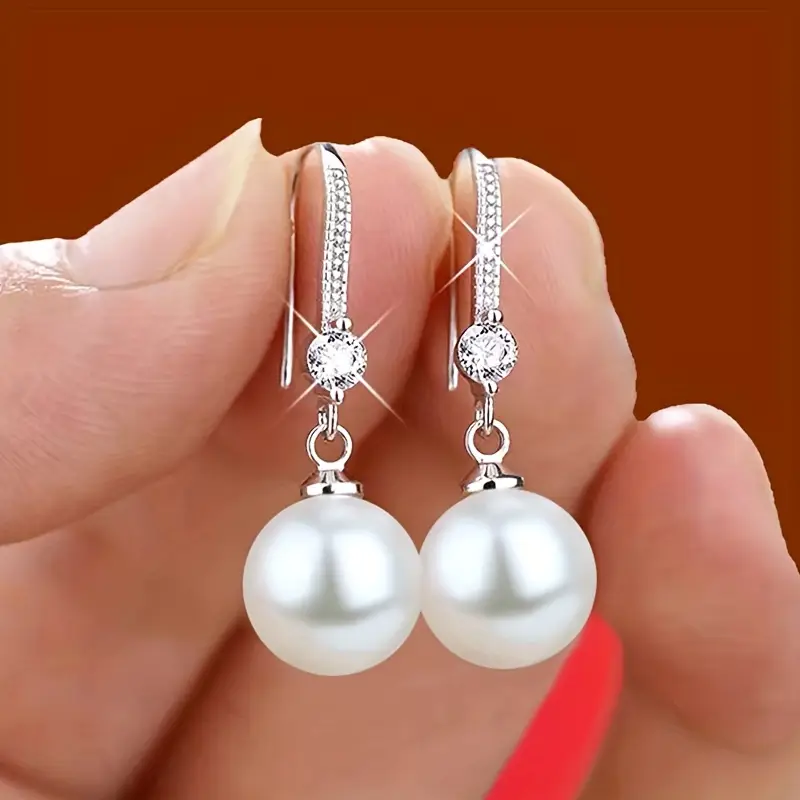 Boucles d'oreilles en perles dorées en zircon