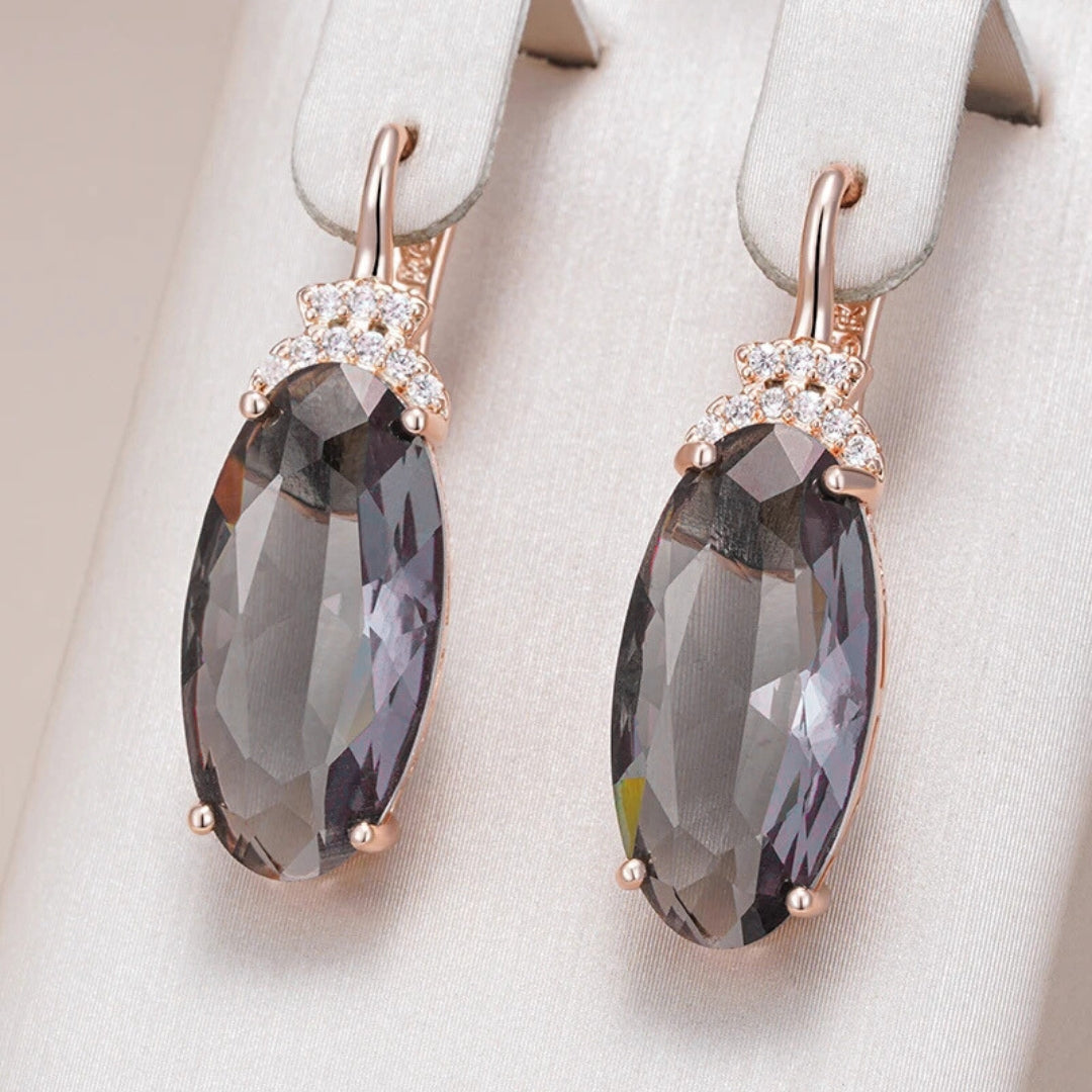 Boucles d'oreilles ovales en cristal noir élégant avec dorure