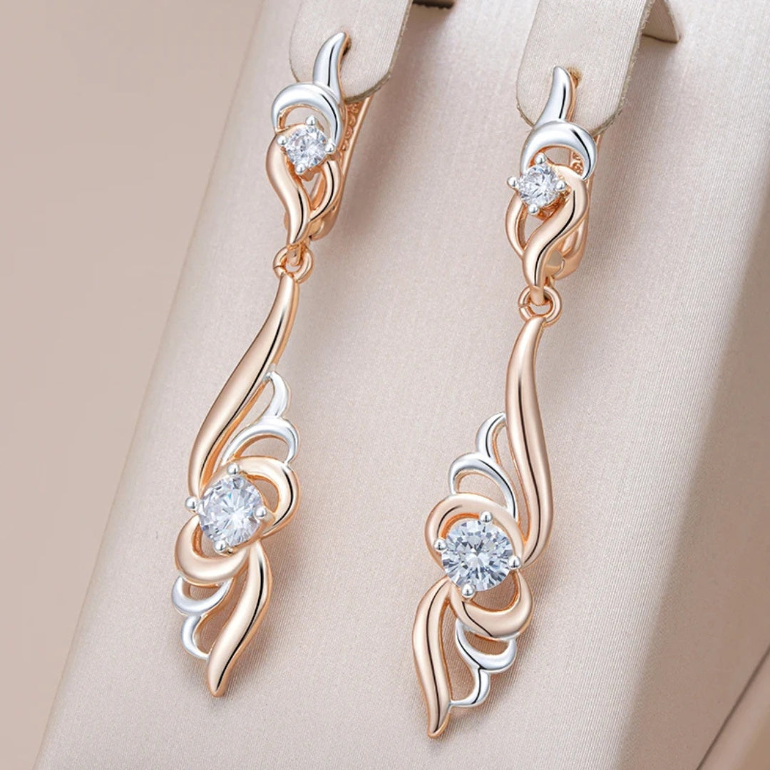 Boucles d'oreilles élégantes pendantes en argent et or