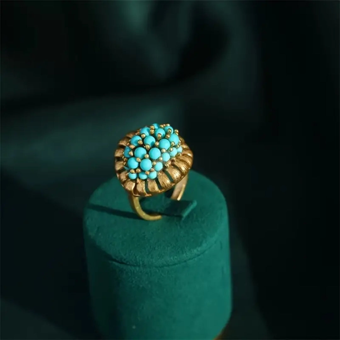 Bague Dorée avec Pierres Bleues Incrustées