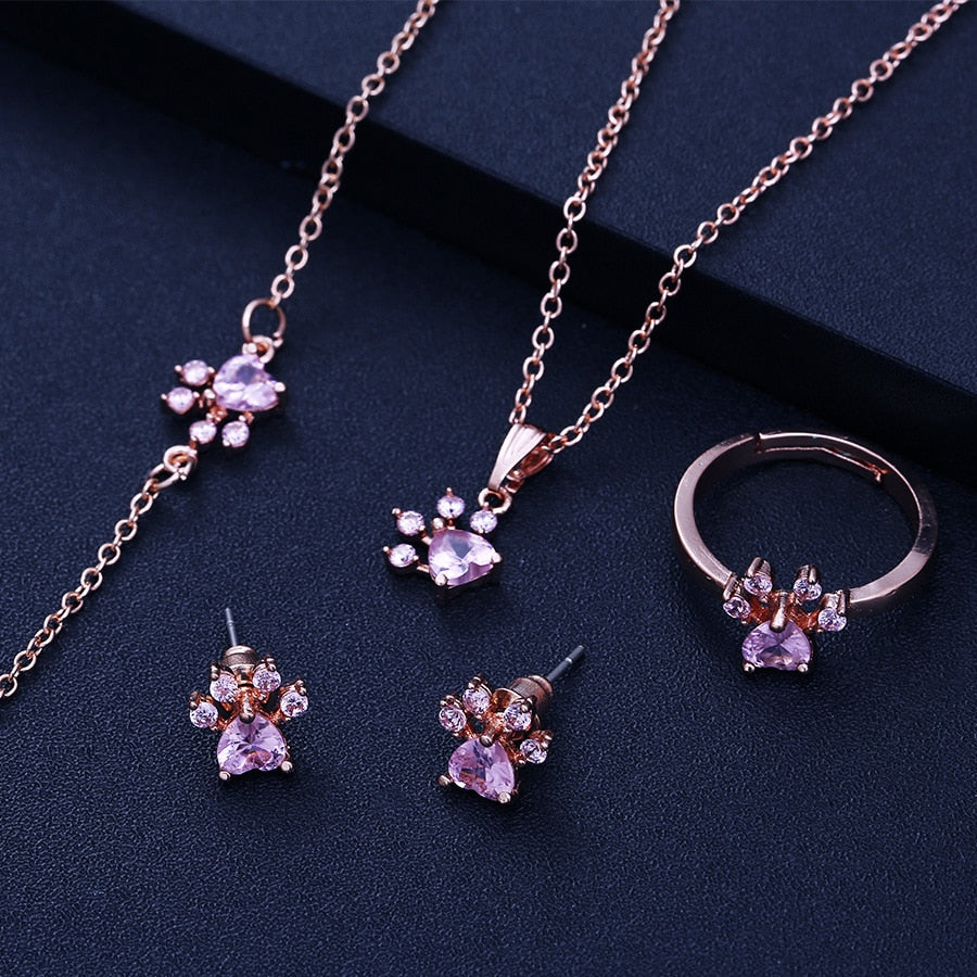 Ensemble de Bijoux Pattes en Or Rose – 4 Pièces avec Cœur en Zirconium (Bague, Collier, Boucles d'Oreilles, Bracelet)